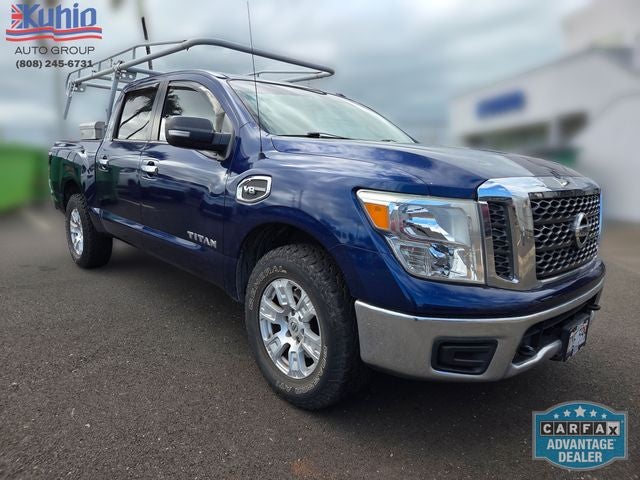 2017 Nissan Titan SV in Deep Blue Pearl — front three-quarter view