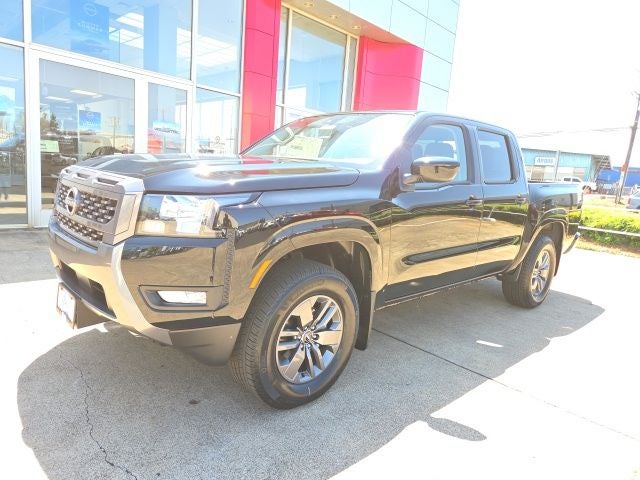 2025 Nissan Frontier SV in Super Black — front three-quarter view