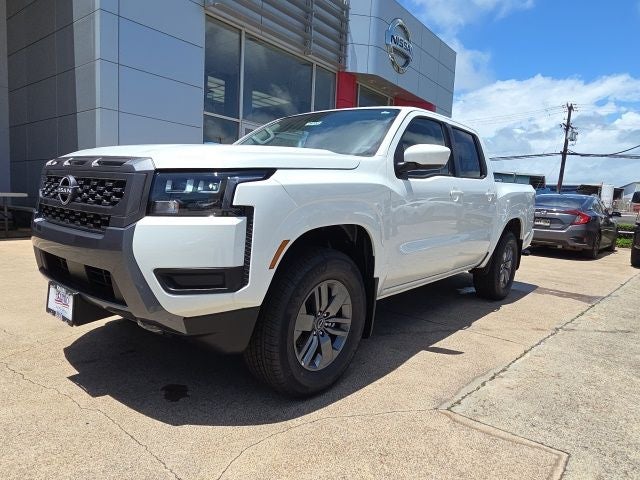 2026 Nissan Frontier SV in Glacier White — front three-quarter view
