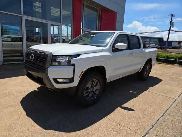 2025 Nissan Frontier SV in Glacier White — front three-quarter view