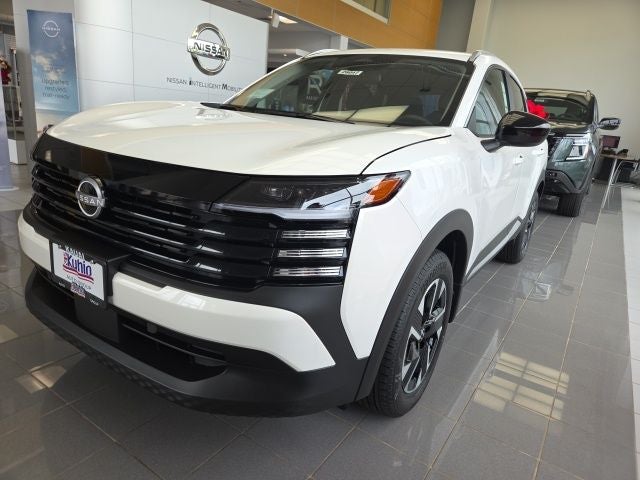 2026 Nissan Kicks SV in Aspen White Tricoat — front three-quarter view