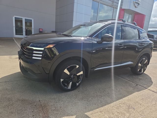 2026 Nissan Kicks SR in Super Black — front three-quarter view