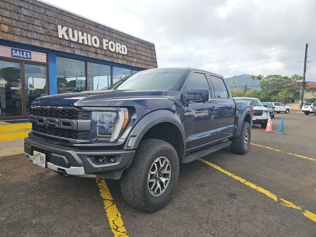 2021 Ford F-150 Raptor in Blue Metallic — front three-quarter view